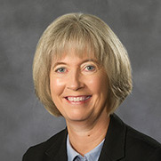 Marianne Baernholdt headshot with gray background
