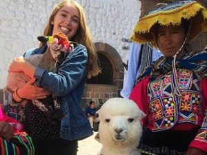 Erin holding an alpaca