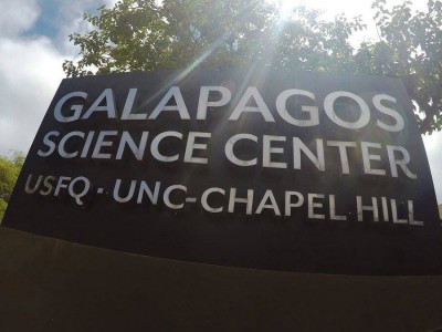 Sign that reads: Galapagos Science Center: USFQ - UNC-Chapel Hill