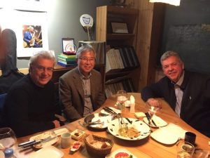 The authors sitting at a table at a restaurant in Seoul.