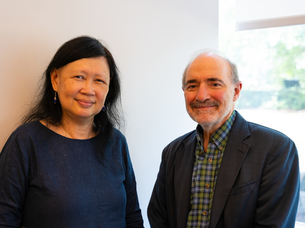 Brenda Yeoh and Peter Coclanis smile at the camera